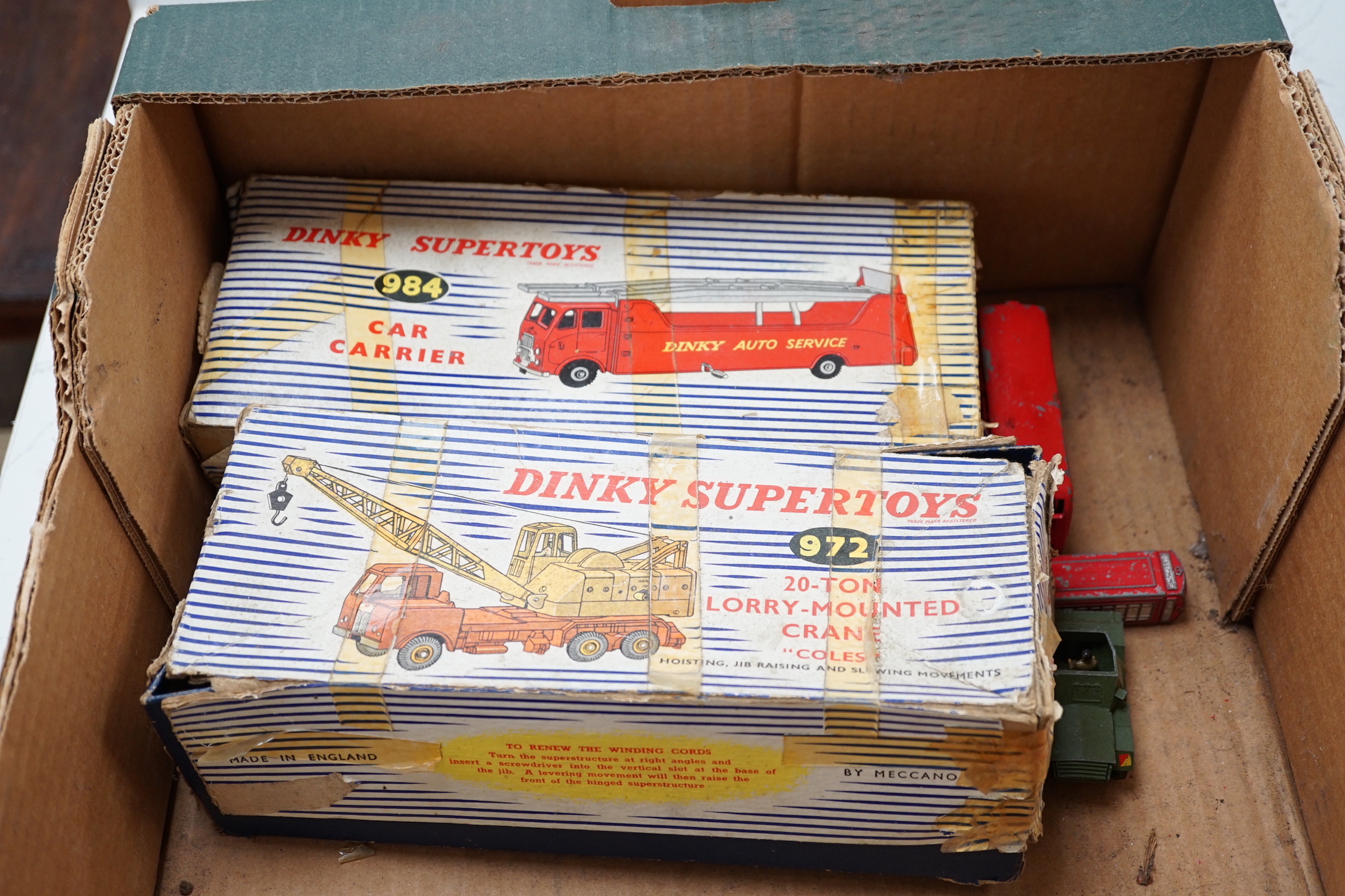 Twenty-two Dinky Toys mostly for restoration, including a Car Carrier (984), Missile Erector, Missile Servicing Platform, Spectrum Pursuit Vehicle, Thunderbird 2 containing Thunderbird 4, Rolls-Royce Silver Wraith, etc.